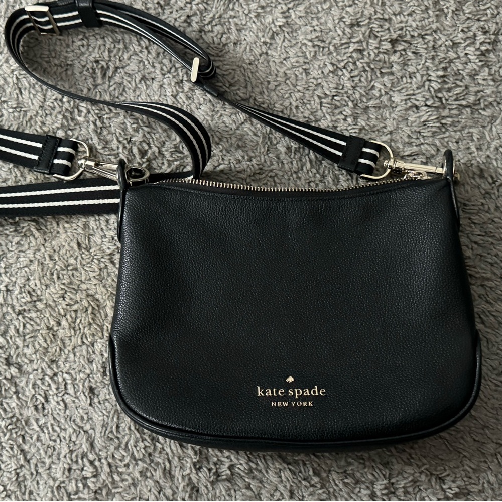 Kate Spade purse with black and white striped strap